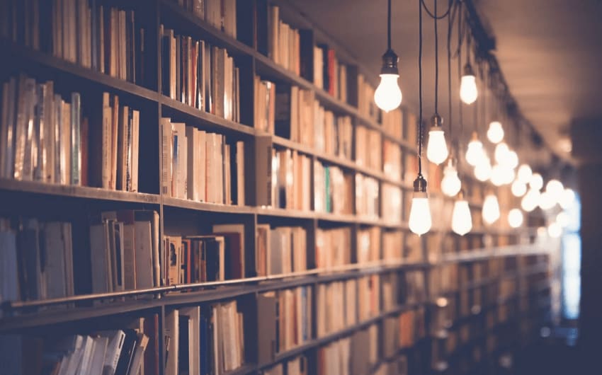Library shelves with a huge number of books